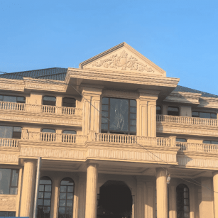 桂林黄金麻别墅外墙干挂石材效果示例