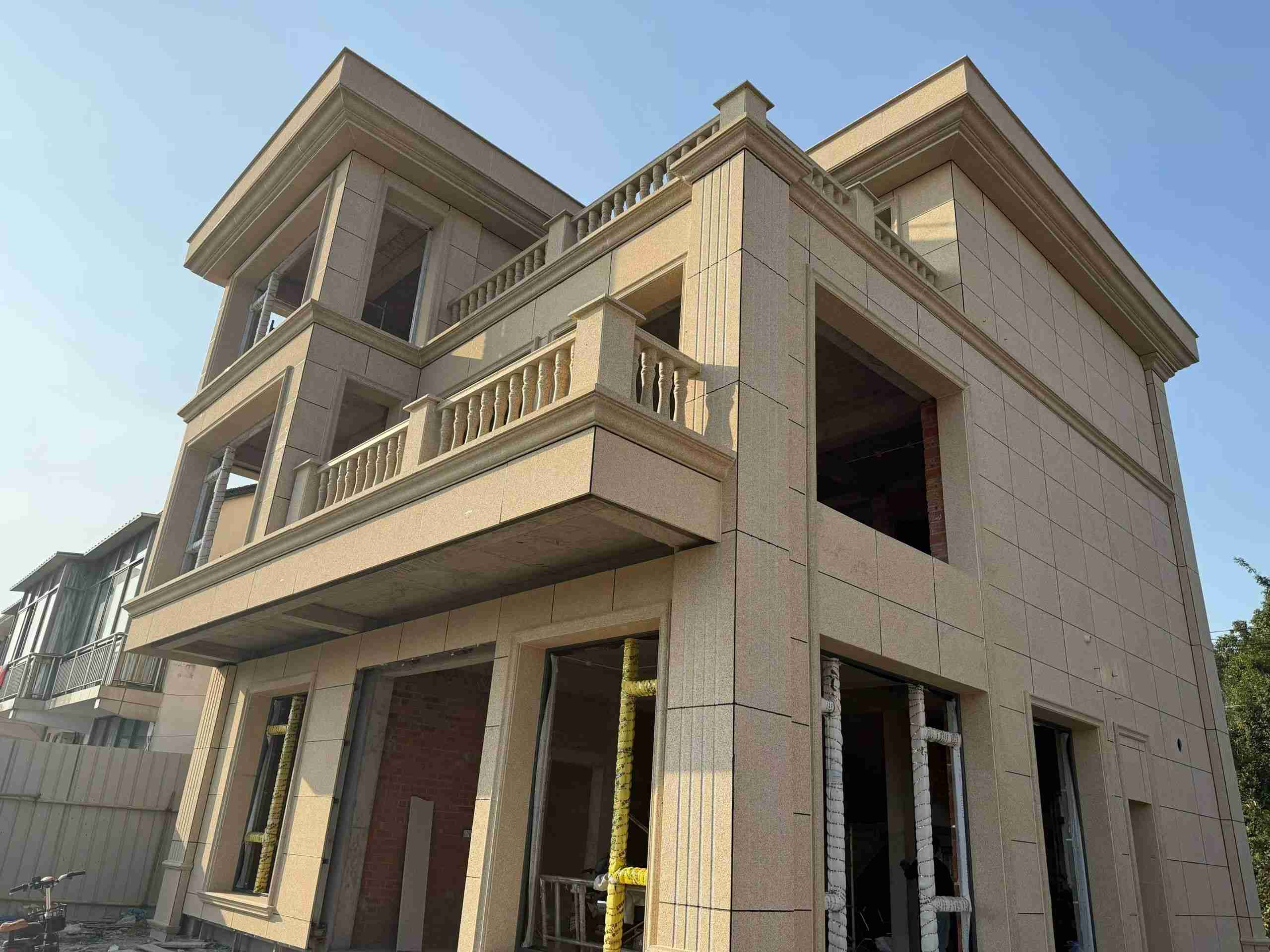 桂林 黄金麻花岗岩石材荔枝面外墙干挂效果展示